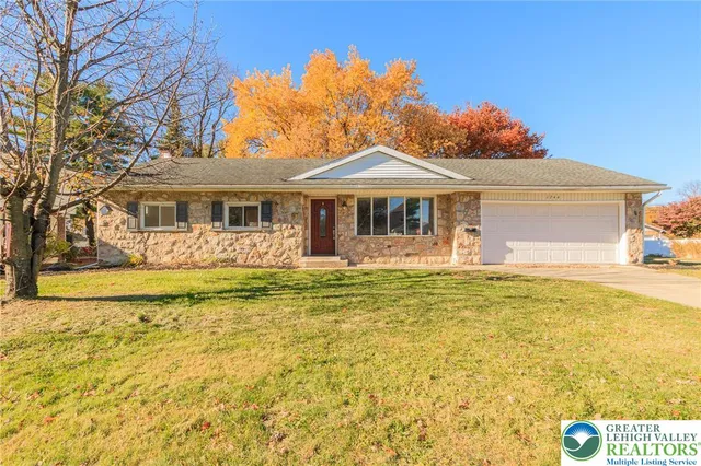 a front view of a house with swimming pool