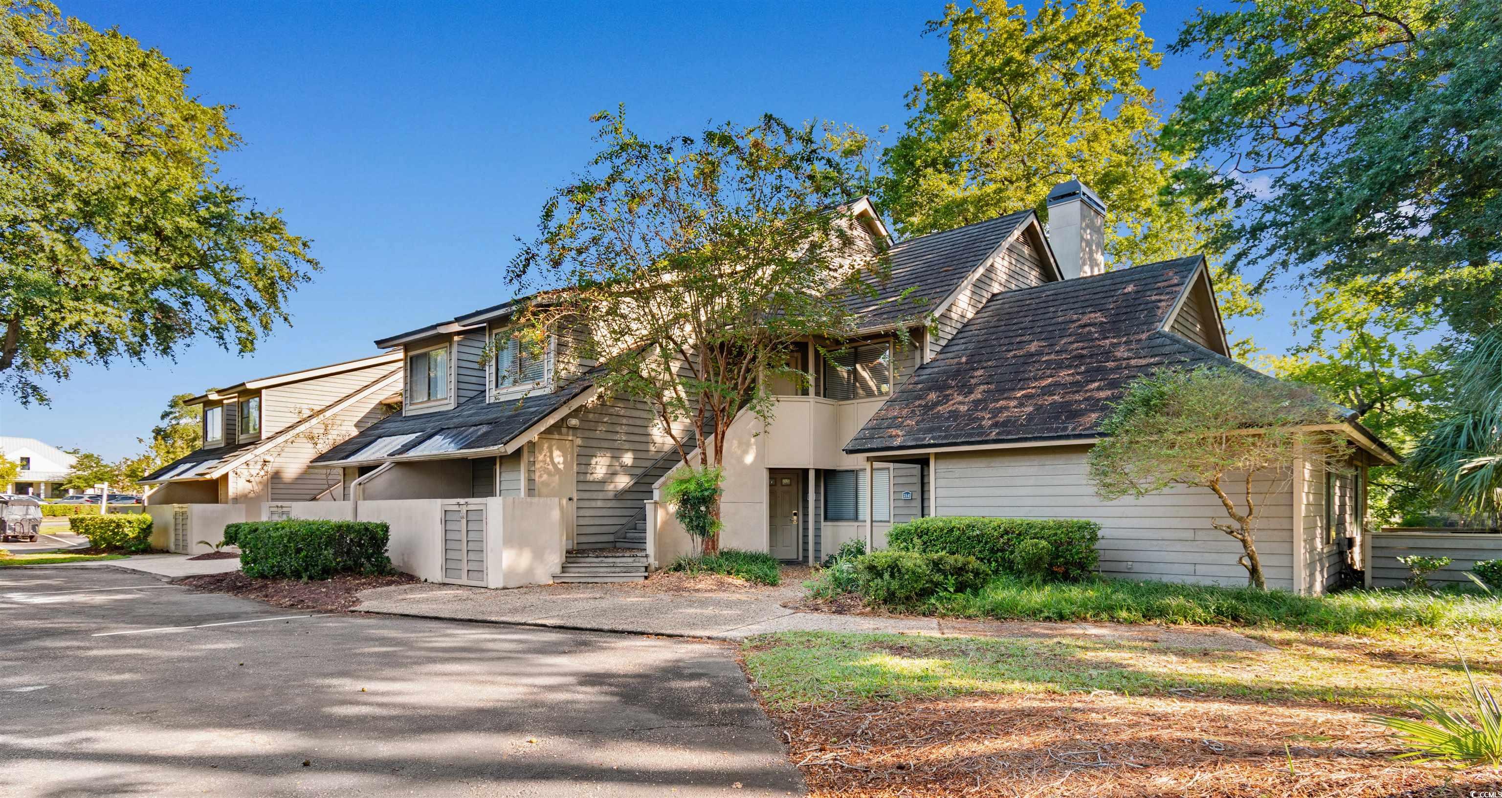 Mid-century inspired home featuring a chimney