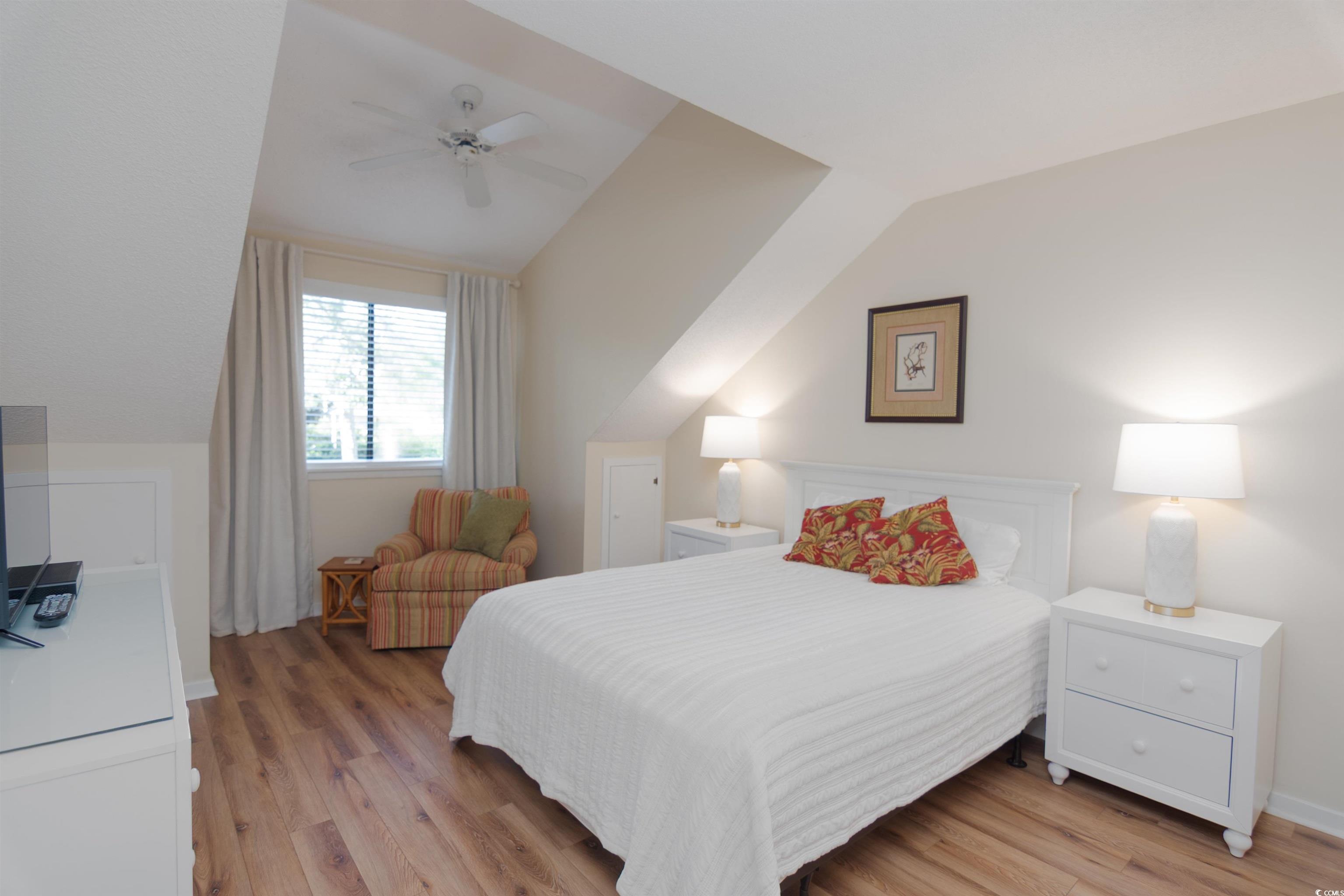 175 St Clears Way, Unit 23I Myrtle Beach, SC 29572 - Photo 21 of 39 Bedroom featuring light wood finished floors, ceiling fan, and vaulted ceiling