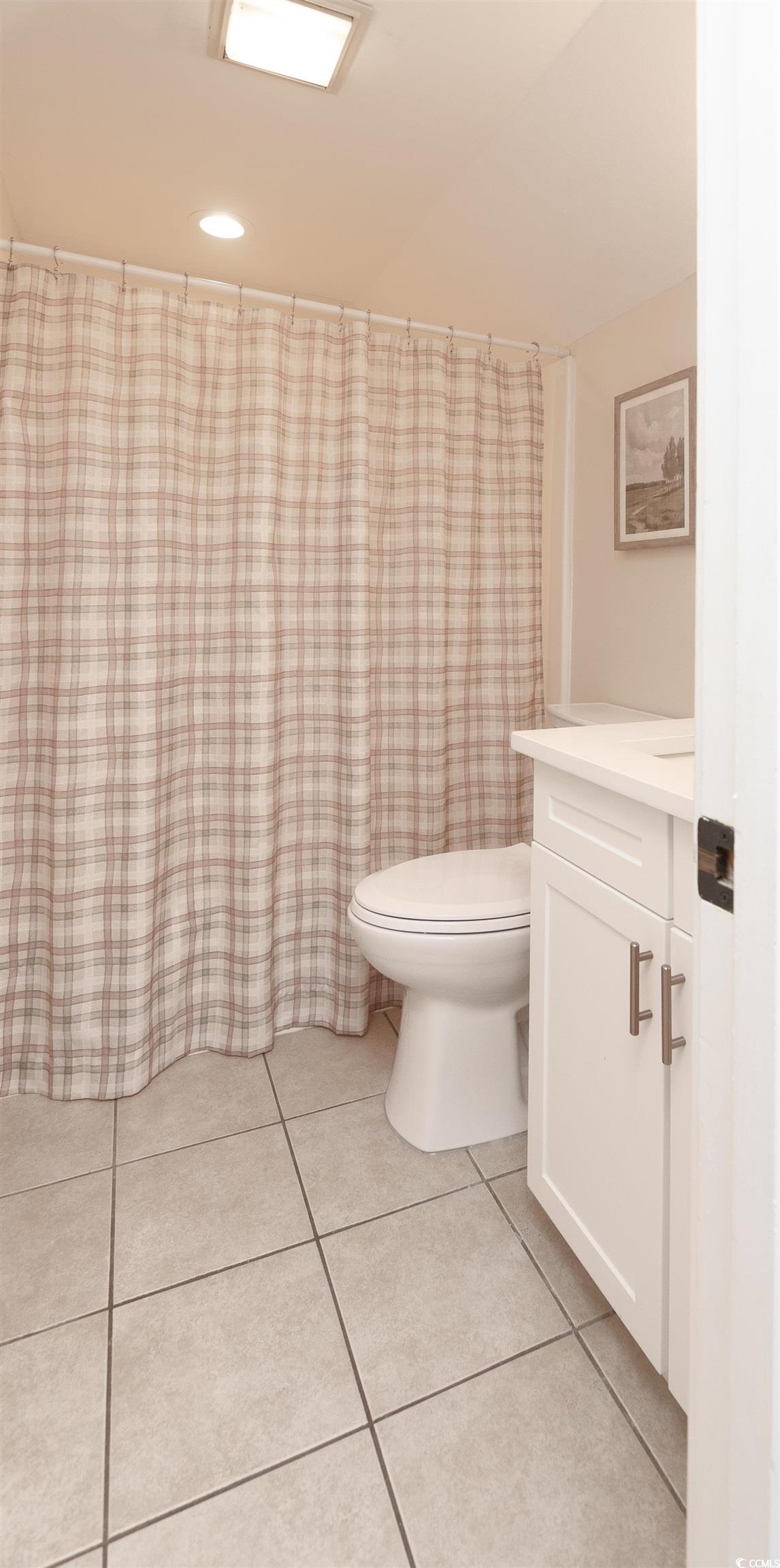 175 St Clears Way, Unit 23I Myrtle Beach, SC 29572 - Photo 26 of 39 Bathroom featuring vanity, a shower with shower curtain, light tile patterned flooring, and recessed lighting