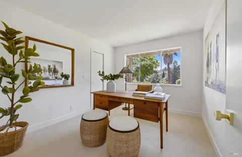 a room with furniture and window