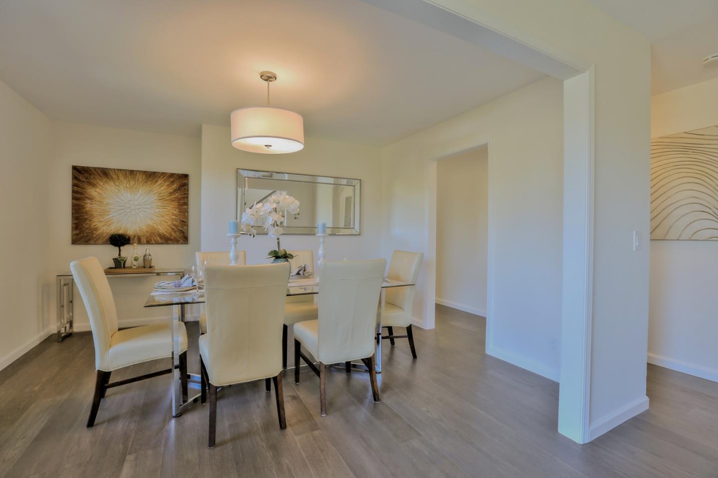 970 Covington Road Los Altos, CA 94024 - Photo 11 of 47 a view of a dining room with furniture window and wooden floor