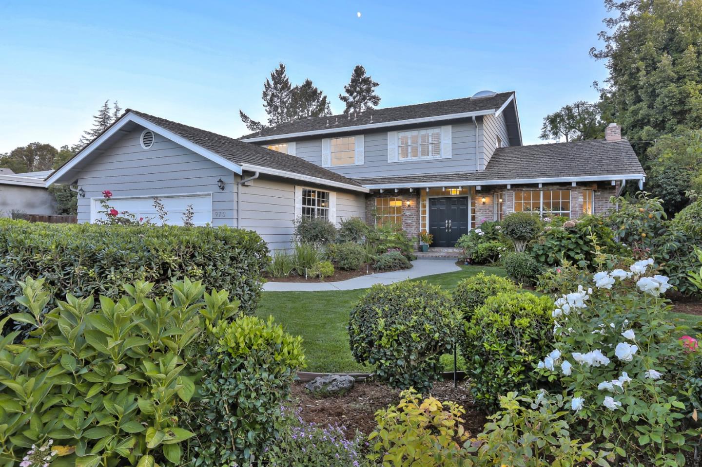 970 Covington Road Los Altos, CA 94024 - Photo 2 of 47 front view of a house with a yard