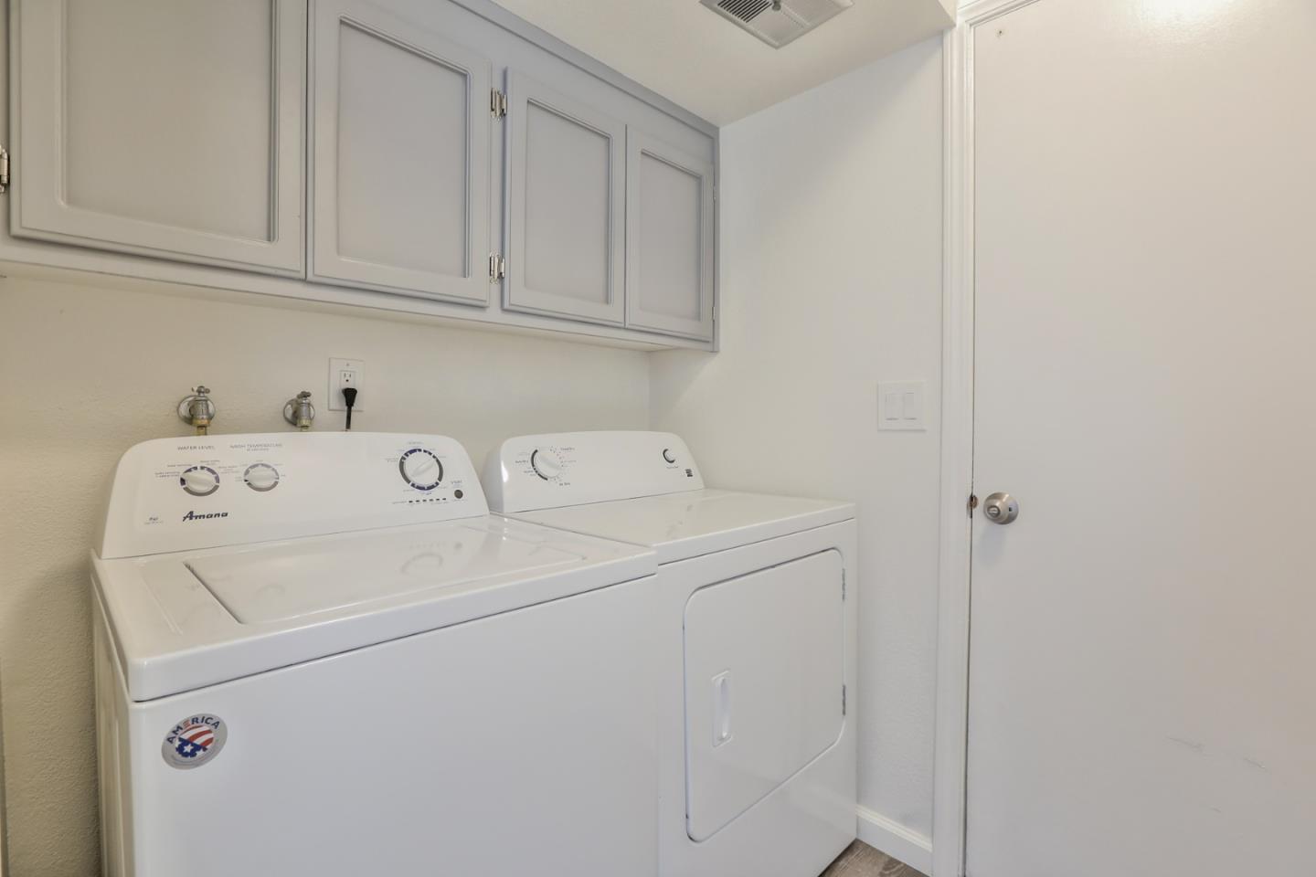 970 Covington Road Los Altos, CA 94024 - Photo 30 of 47 a utility room with dryer and washer