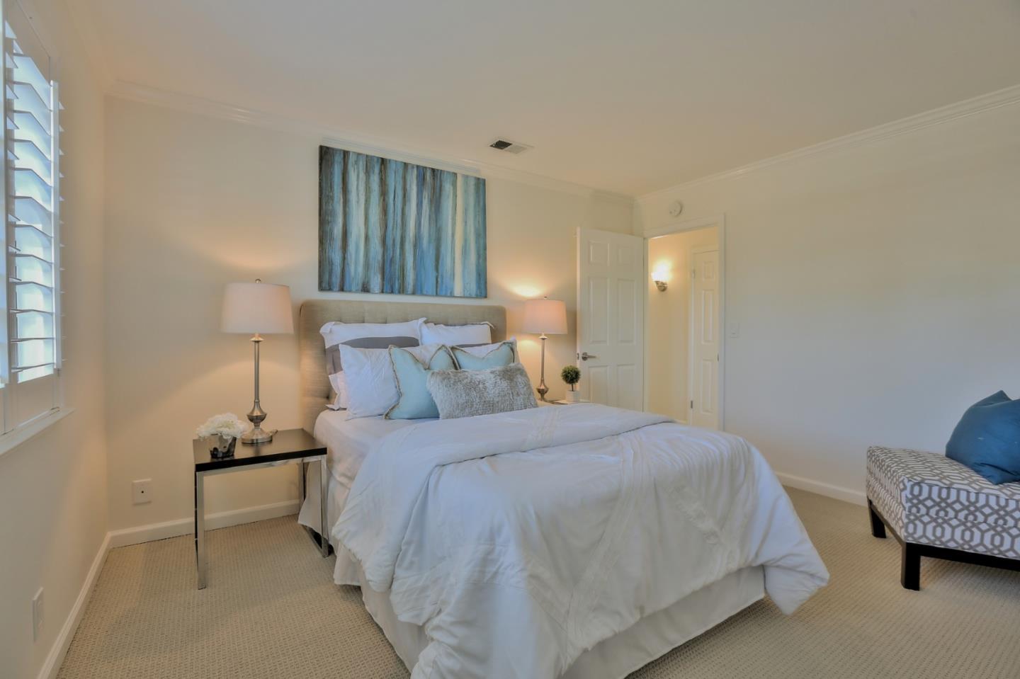 970 Covington Road Los Altos, CA 94024 - Photo 34 of 47 a bedroom with a bed and a couch