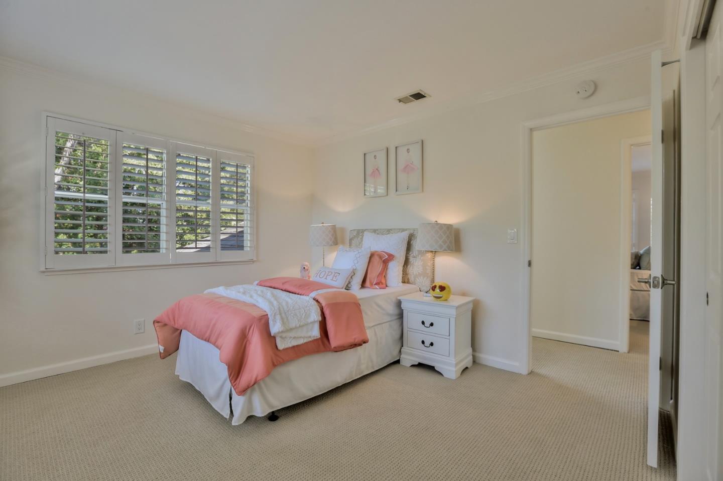 970 Covington Road Los Altos, CA 94024 - Photo 37 of 47 a bed room with a bed and a window