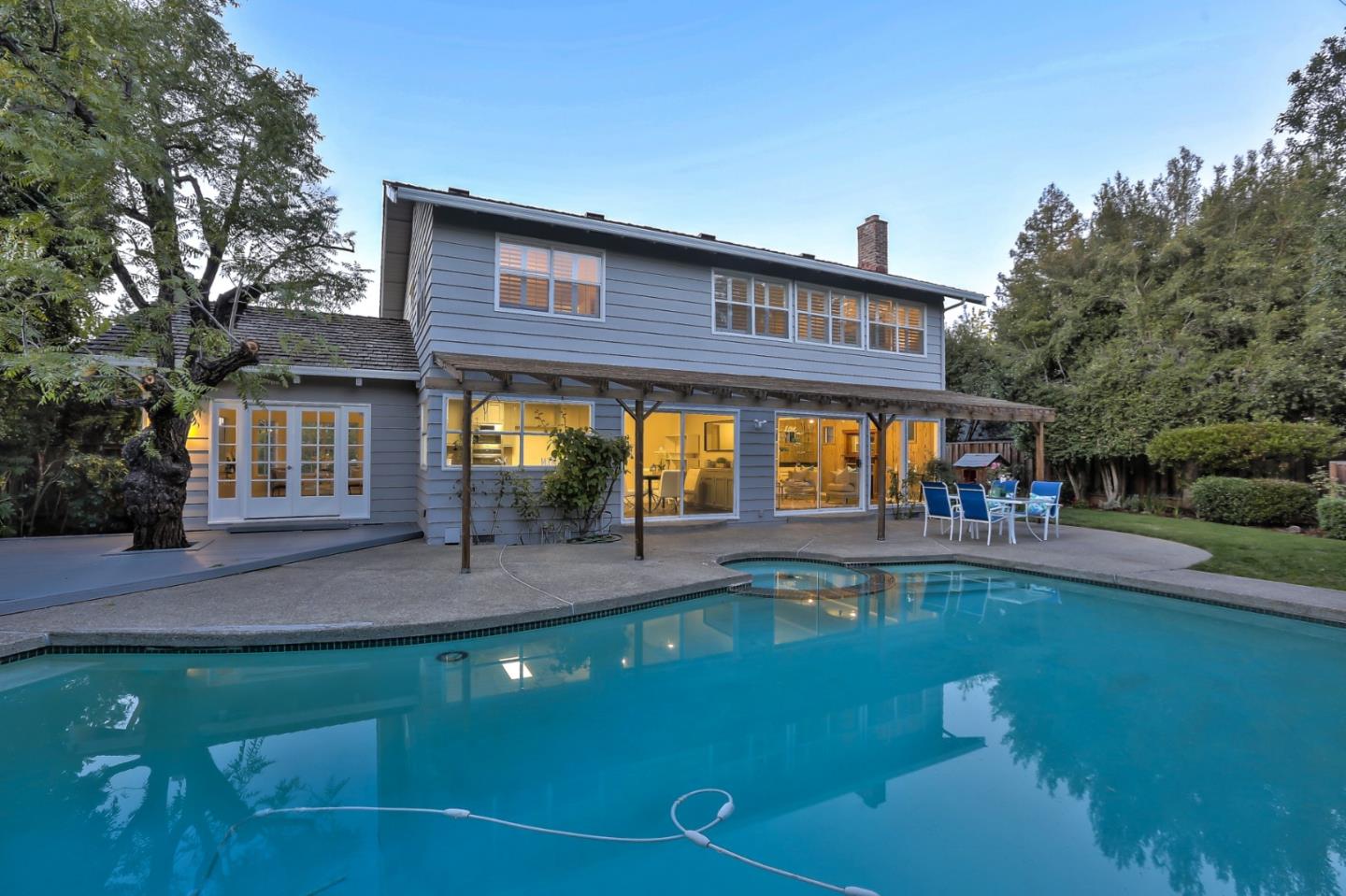970 Covington Road Los Altos, CA 94024 - Photo 45 of 47 a view of a house with swimming pool and sitting area