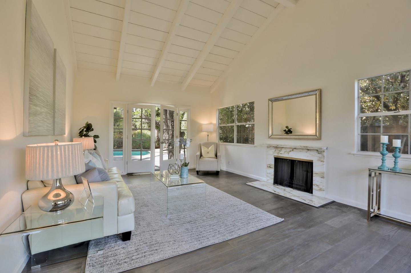 970 Covington Road Los Altos, CA 94024 - Photo 9 of 47 a living room with furniture and a fireplace