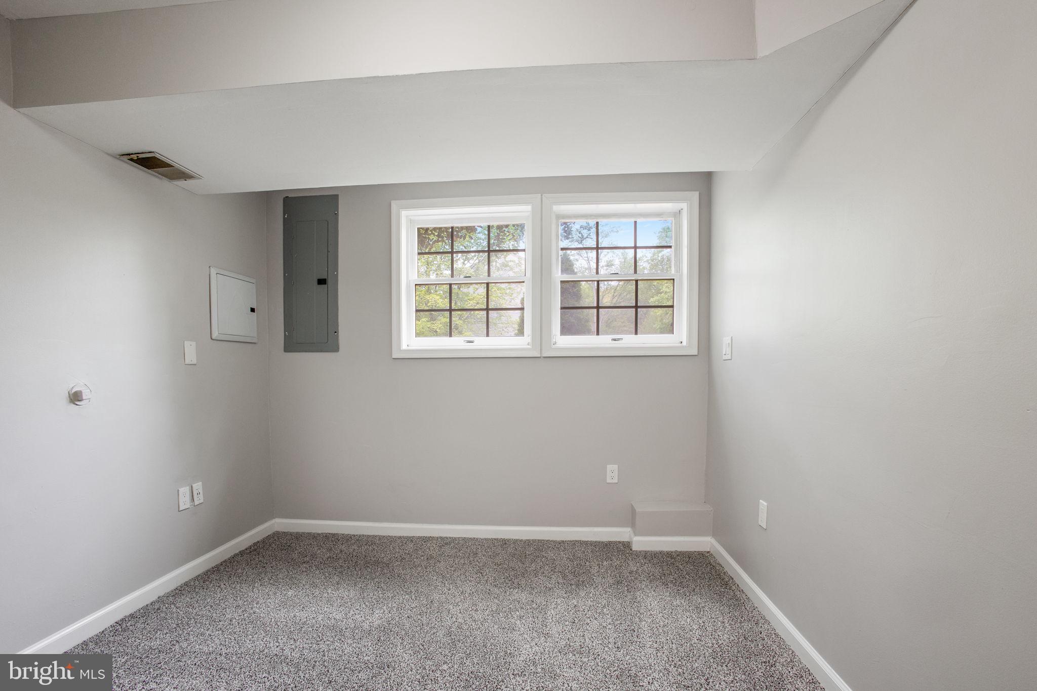 2102 Commissary Circle Odenton, MD 21113 - Photo 49 of 54 an empty room with a window