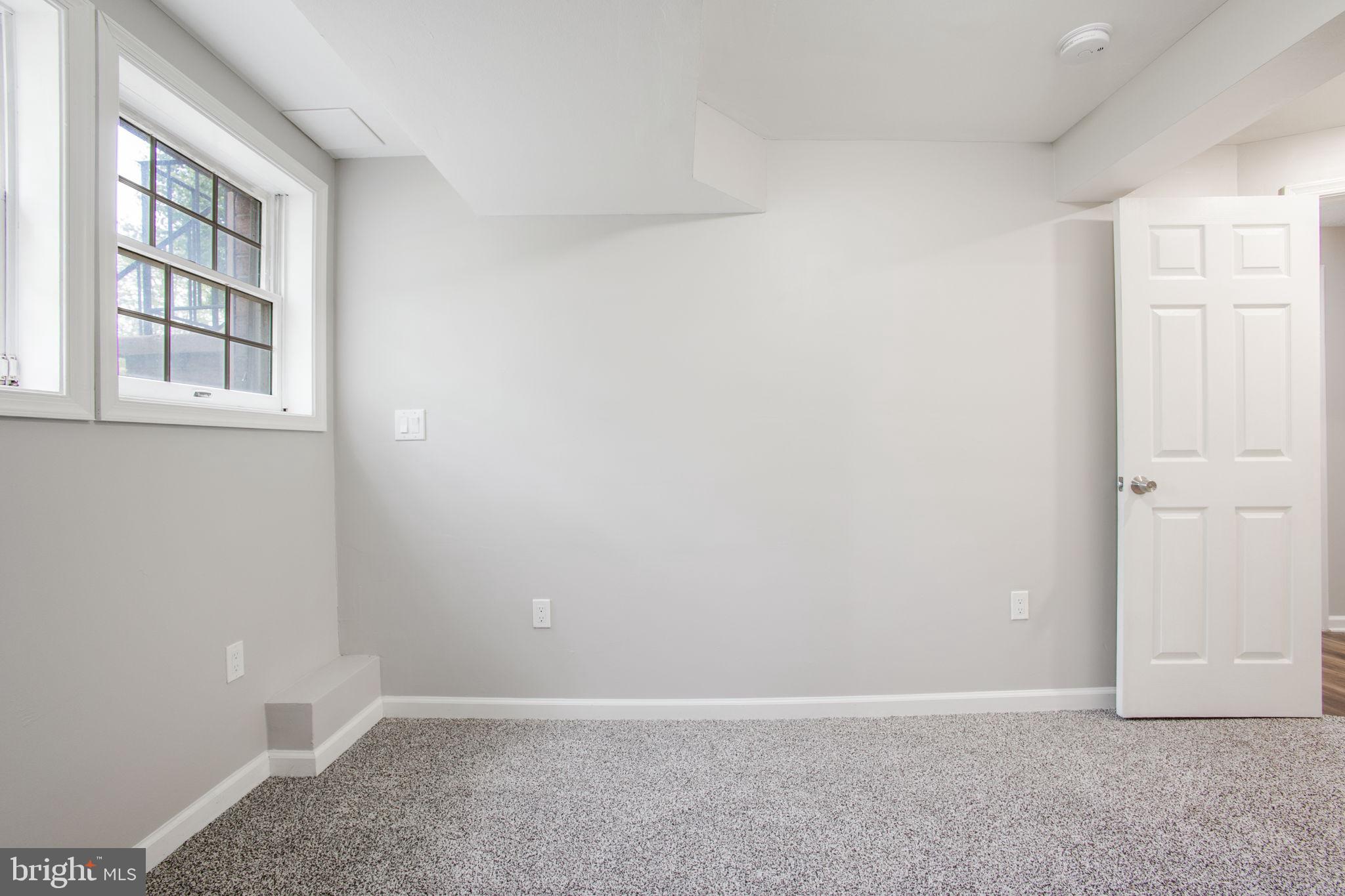 2102 Commissary Circle Odenton, MD 21113 - Photo 50 of 54 an empty room with windows