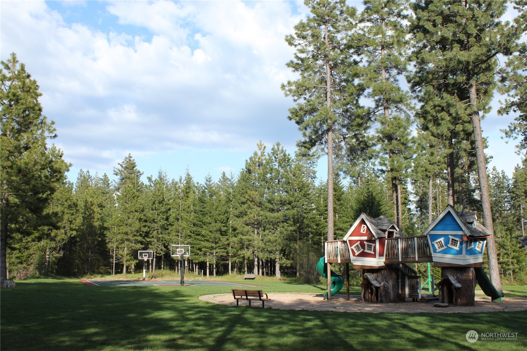 961 Larkspur Loop Cle Elum, WA 98922 - Photo 11 of 17 a childrens park with lots of trees and plants