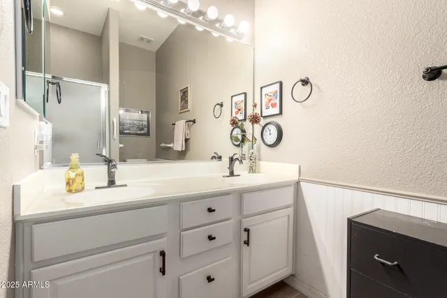 a bedroom with a bed and a closet