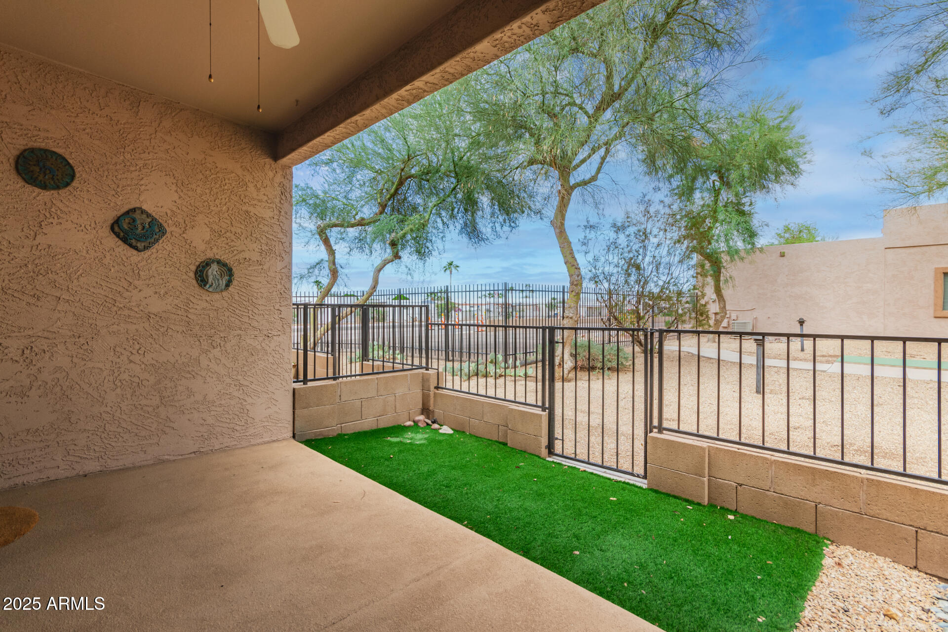 2368 West 10th Avenue Apache Junction, AZ 85120 - Photo 19 of 30 a view of a backyard with a garden