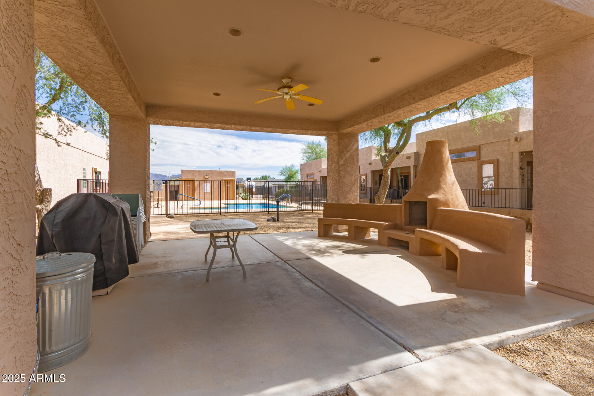 2368 West 10th Avenue Apache Junction, AZ 85120 - Photo 25 of 30 a living room with furniture and a large window