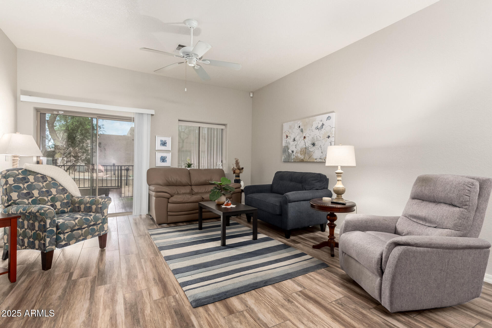 2368 West 10th Avenue Apache Junction, AZ 85120 - Photo 6 of 30 a living room with furniture and a fireplace