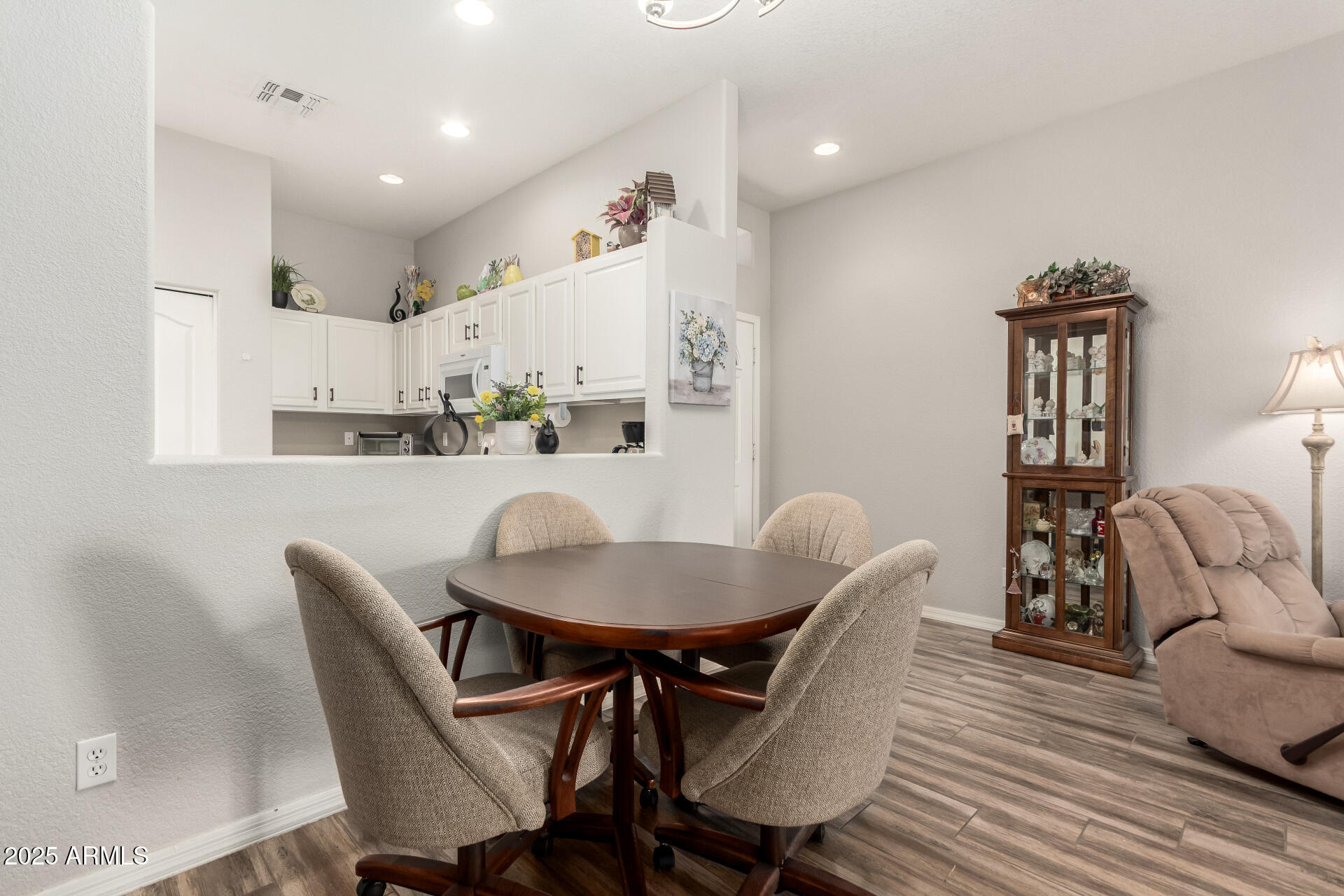 2368 West 10th Avenue Apache Junction, AZ 85120 - Photo 9 of 30 a dining room with furniture and window