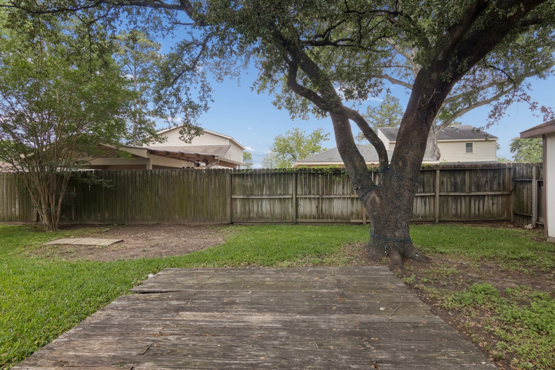 2607 Allyson Court Spring, TX 77373 - Photo 25 of 25 a view of a yard with a large trees and a large tree
