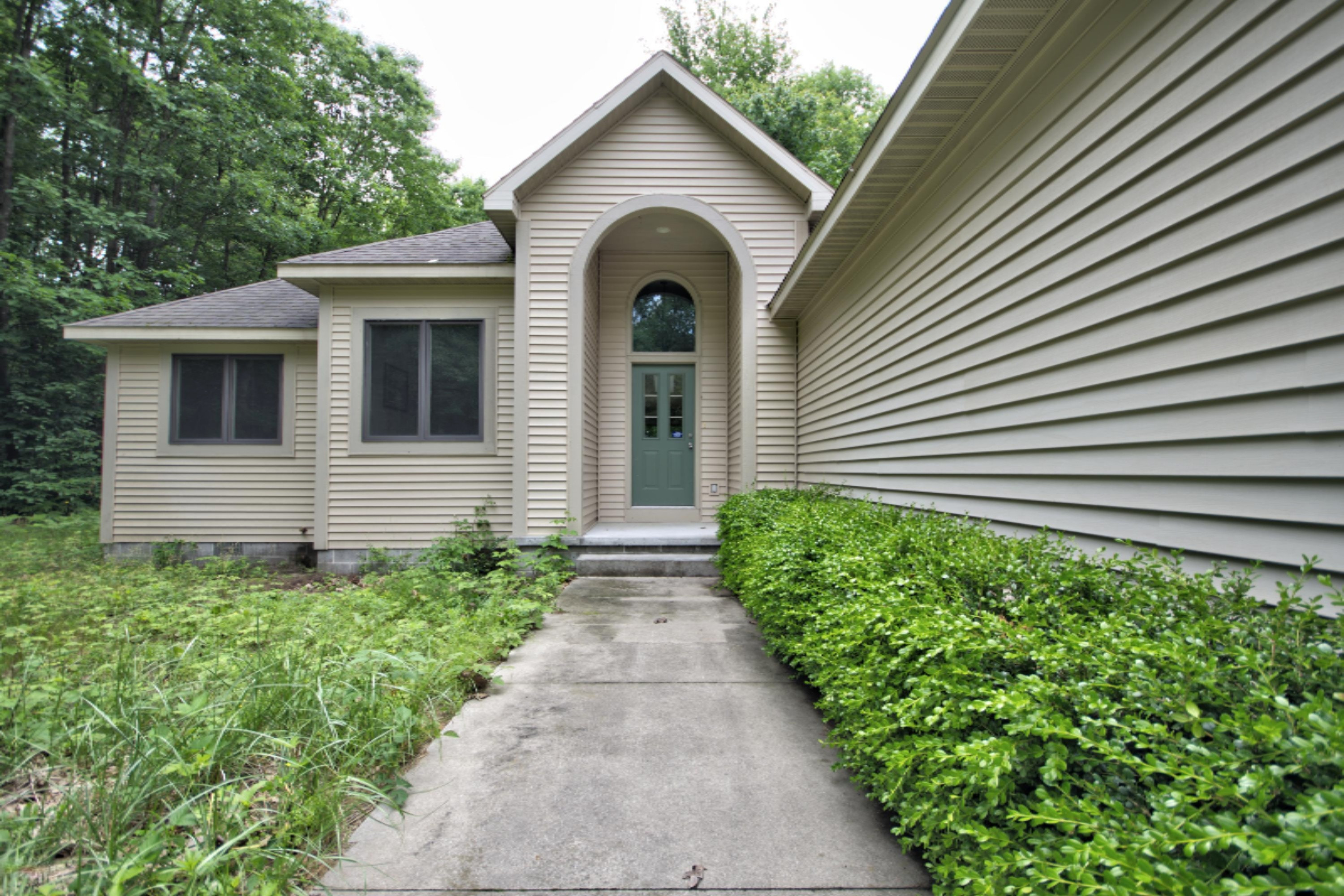 5805 Nestrom Road Whitehall, MI 49461 - Photo 3 of 26 Front Walkway