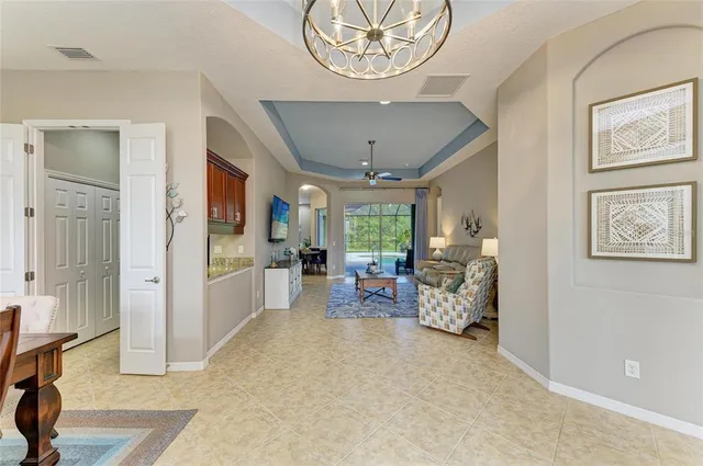 a view of a dining room with furniture window and outside view