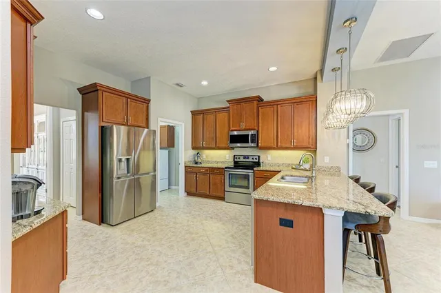 a bathroom with a bathtub sink and mirror