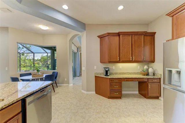 a bedroom with a bed and a ceiling fan