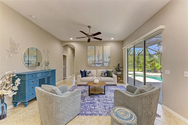 an aerial view of a house with a garden and swimming pool