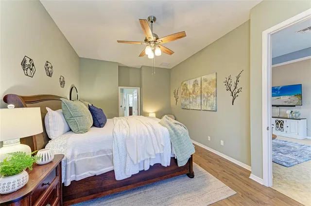 a lobby with furniture and floor to ceiling window
