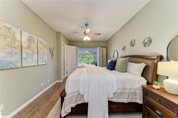 a lobby with furniture and floor to ceiling window