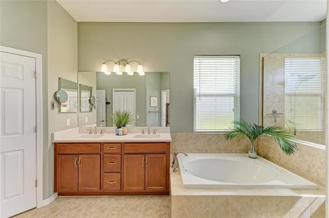 a view of a backyard with sitting area