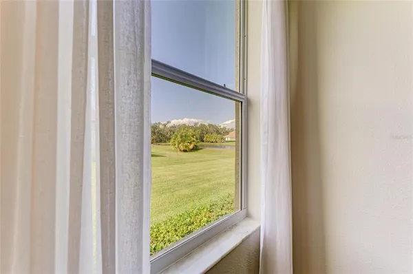 an aerial view of a house with a swimming pool yard and outdoor seating