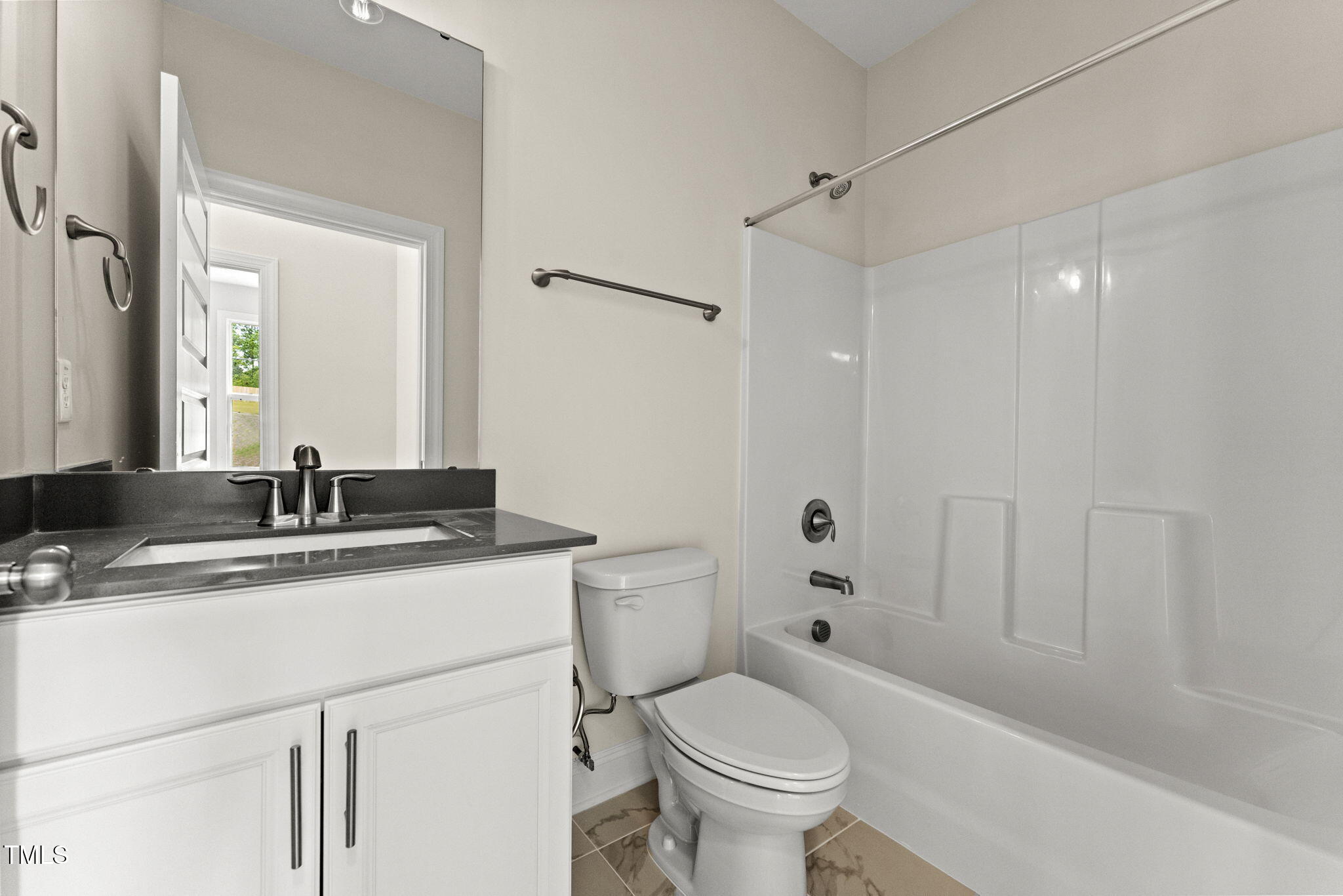 134 Ivy Rdg Road Chapel Hill, NC 27516 - Photo 17 of 37 a bathroom with a sink toilet vanity and shower