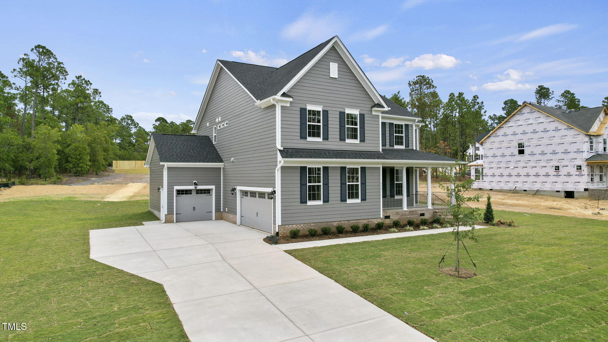 134 Ivy Rdg Road Chapel Hill, NC 27516 - Photo 2 of 37 a front view of a house with a yard