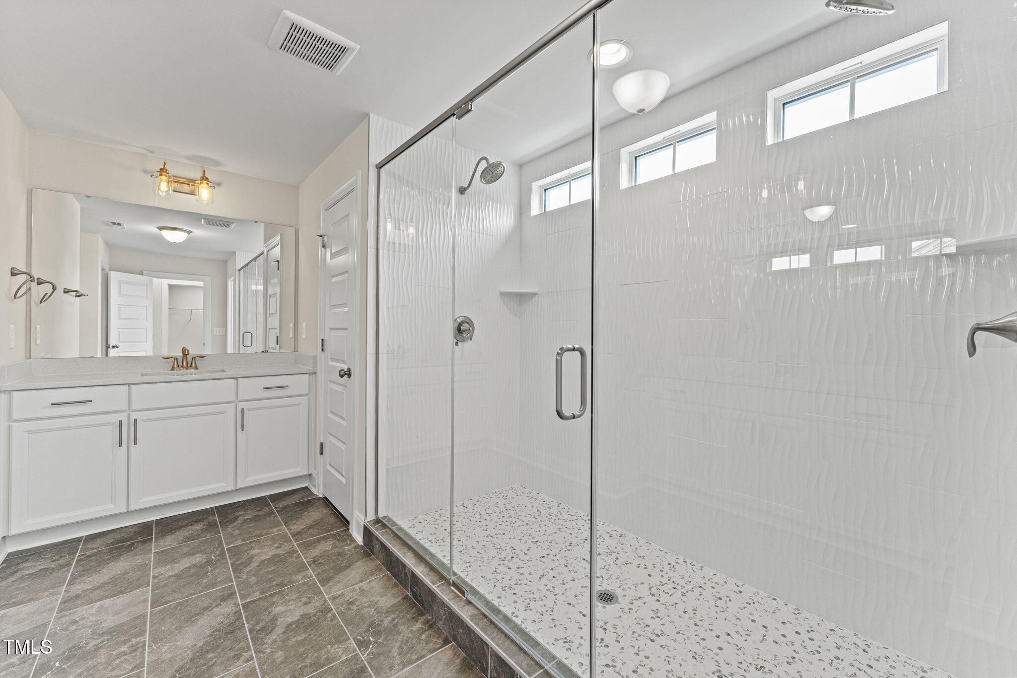 134 Ivy Rdg Road Chapel Hill, NC 27516 - Photo 25 of 37 a bathroom with a shower and a sink