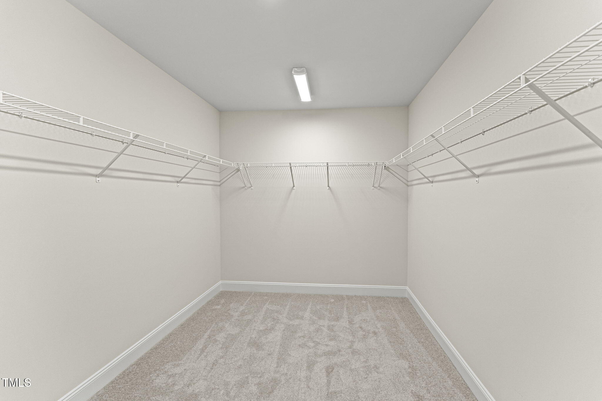 134 Ivy Rdg Road Chapel Hill, NC 27516 - Photo 26 of 37 a view of a room with racks on the wall