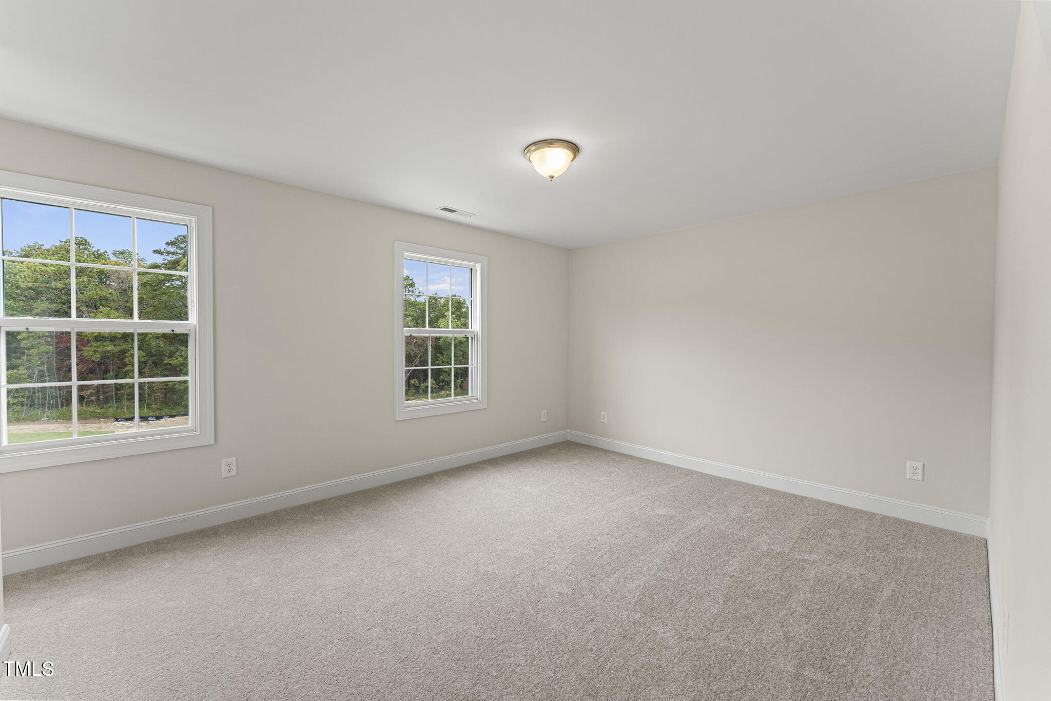 134 Ivy Rdg Road Chapel Hill, NC 27516 - Photo 31 of 37 an empty room with a window