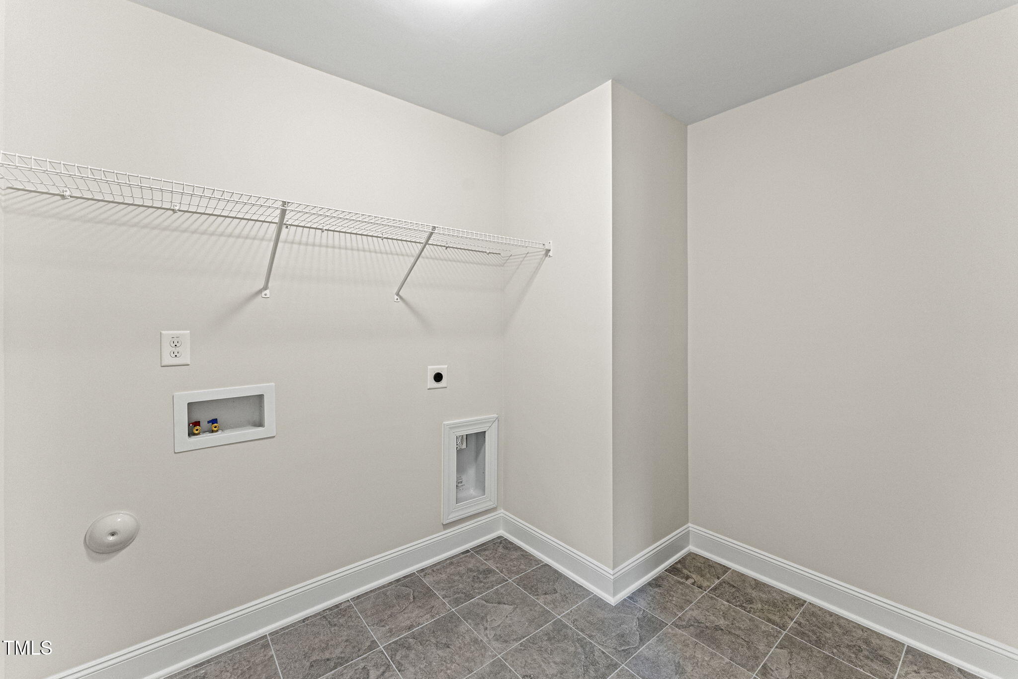 134 Ivy Rdg Road Chapel Hill, NC 27516 - Photo 32 of 37 a view of a room with racks on the wall