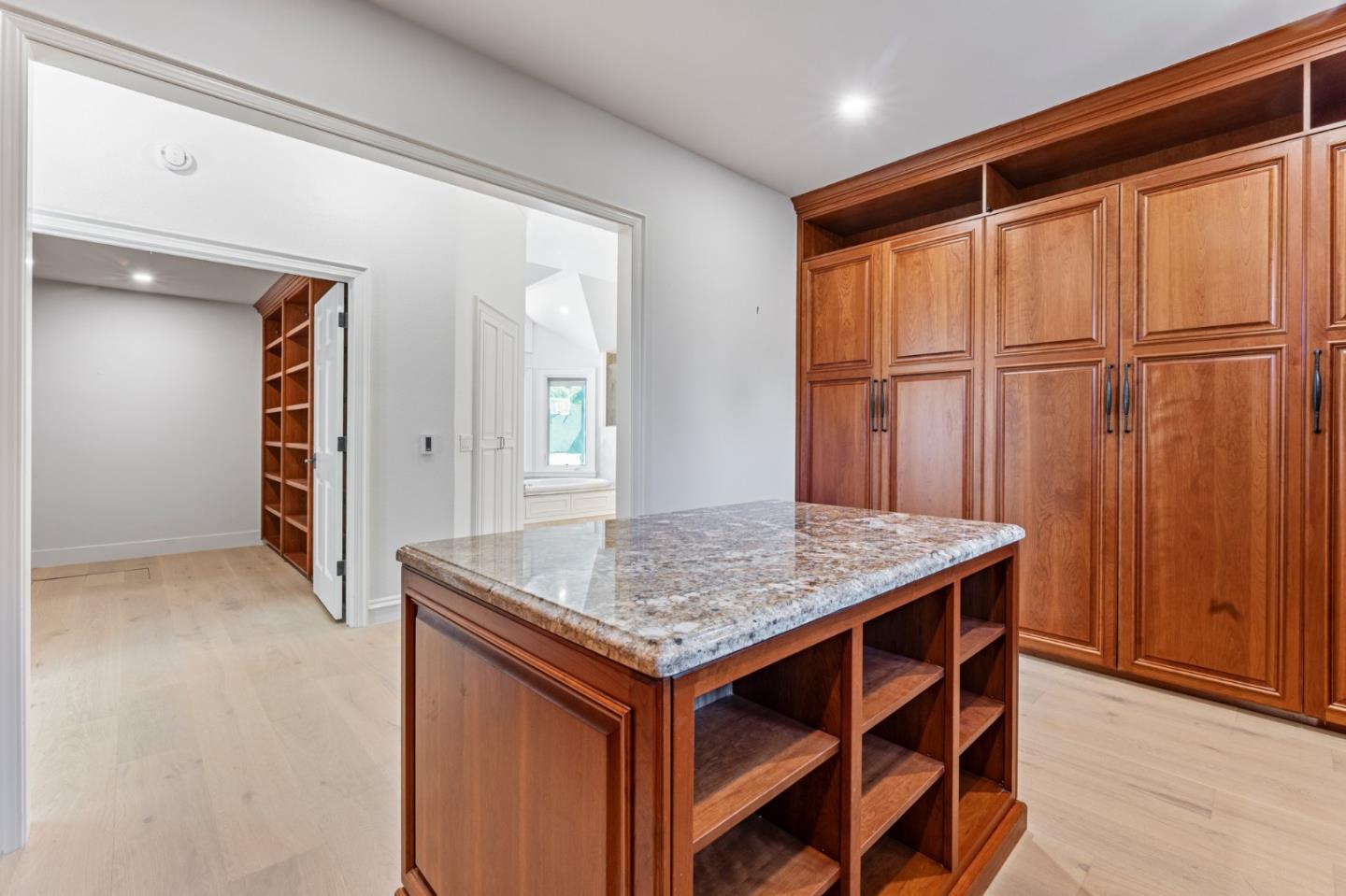 1080 Finley Road Pleasanton, CA 94588 - Photo 21 of 85 an empty room with wooden floor and windows