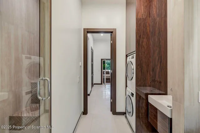a view of a patio with a table and chairs