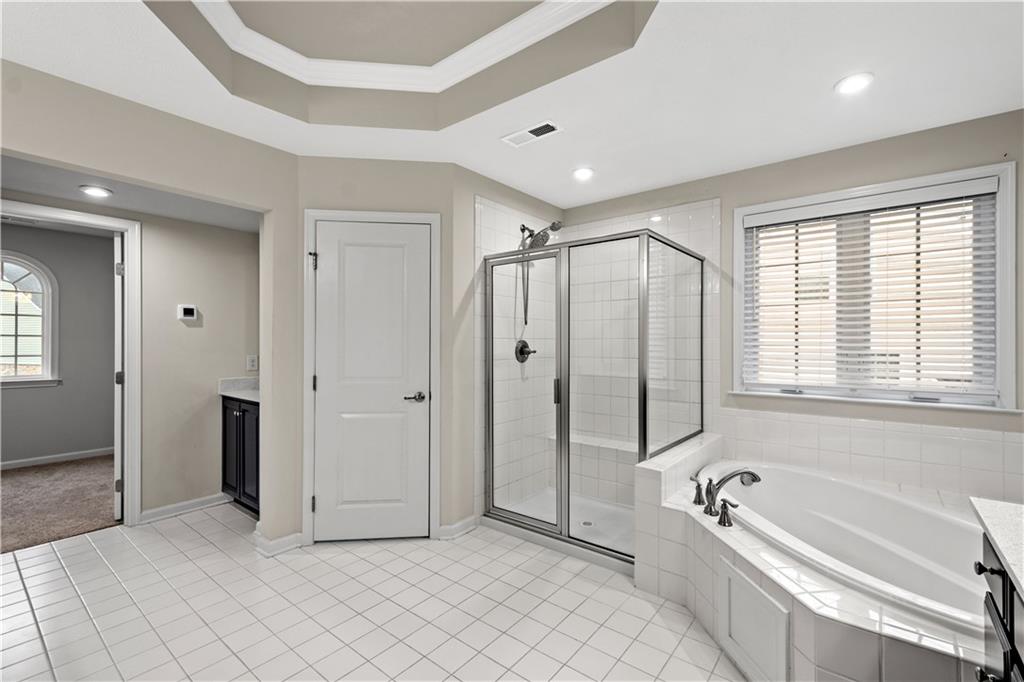 4441 Walnut Ridge Circle McDonald, PA 15057 - Photo 12 of 25 Walk-in shower & soaking tub for days when you need a little extra relaxation!
