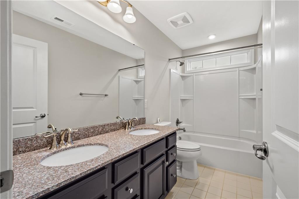 4441 Walnut Ridge Circle McDonald, PA 15057 - Photo 17 of 25 Full hall bath on the upper level with double bowl vanity.