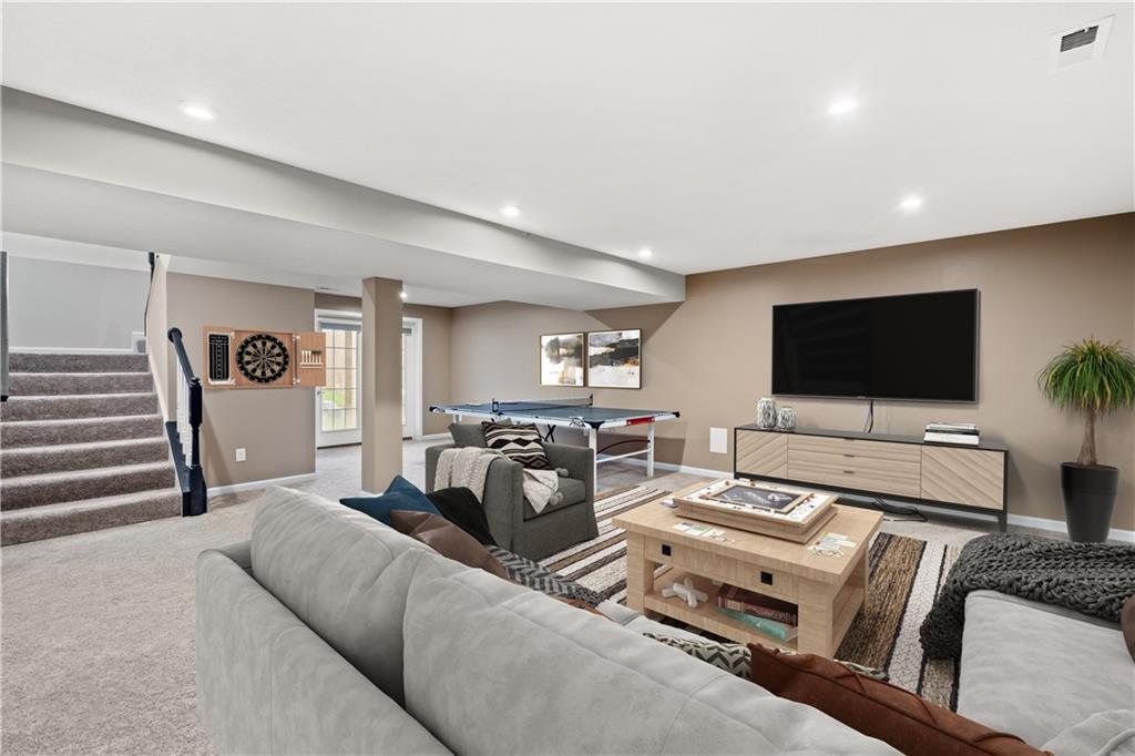 4441 Walnut Ridge Circle McDonald, PA 15057 - Photo 20 of 25 Huge finished basement with walk-out access to the yard makes for the perfect entertaining space that you'll love hanging out in!*Virtually Staged*