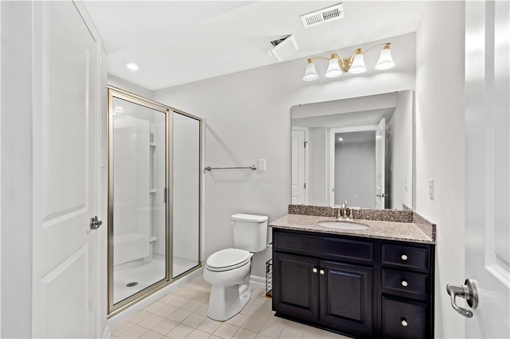 4441 Walnut Ridge Circle McDonald, PA 15057 - Photo 22 of 25 Full basement bath boasts a walk-in shower & spacious vanity.