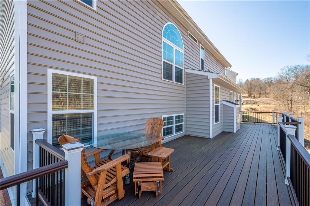 4441 Walnut Ridge Circle McDonald, PA 15057 - Photo 24 of 25 40x11 Trex Deck with wooded backdrop is the perfect spot for outdoor entertaining!