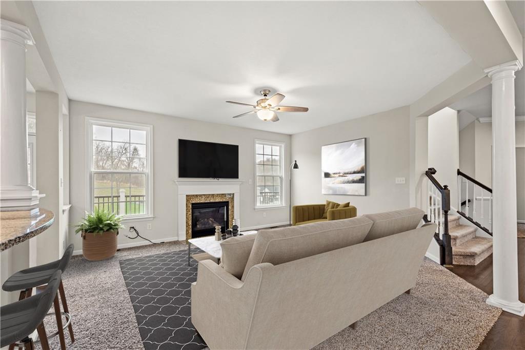 4441 Walnut Ridge Circle McDonald, PA 15057 - Photo 9 of 25 Warm & inviting Family room featuring a gas fireplace!*Virtually Staged*