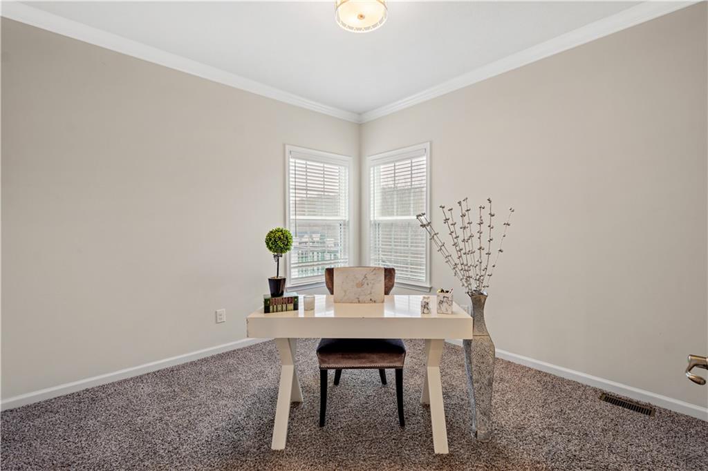 4441 Walnut Ridge Circle McDonald, PA 15057 - Photo 10 of 25 Private first floor office with neutral tones, natural light & crown moulding.