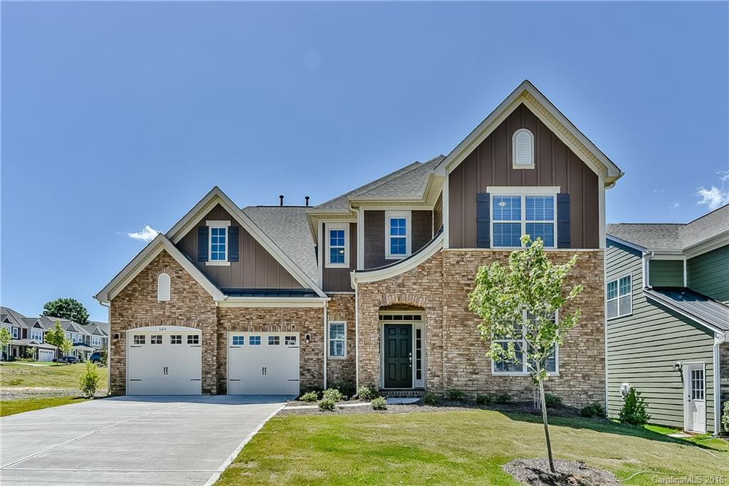 604 Brookhaven Drive, Unit HKC 95 Fort Mill, SC 29708 - Photo 1 of 24 a front view of a house with a yard