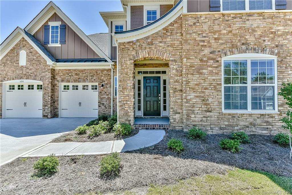 604 Brookhaven Drive, Unit HKC 95 Fort Mill, SC 29708 - Photo 2 of 24 a front view of a house with garden