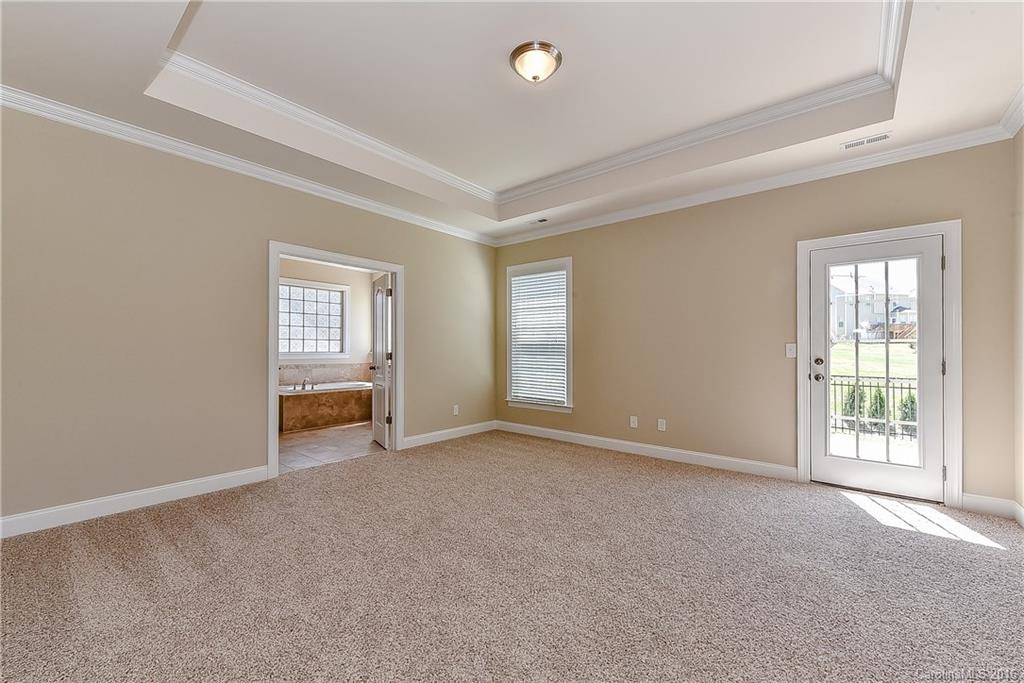 604 Brookhaven Drive, Unit HKC 95 Fort Mill, SC 29708 - Photo 13 of 24 an empty room with windows