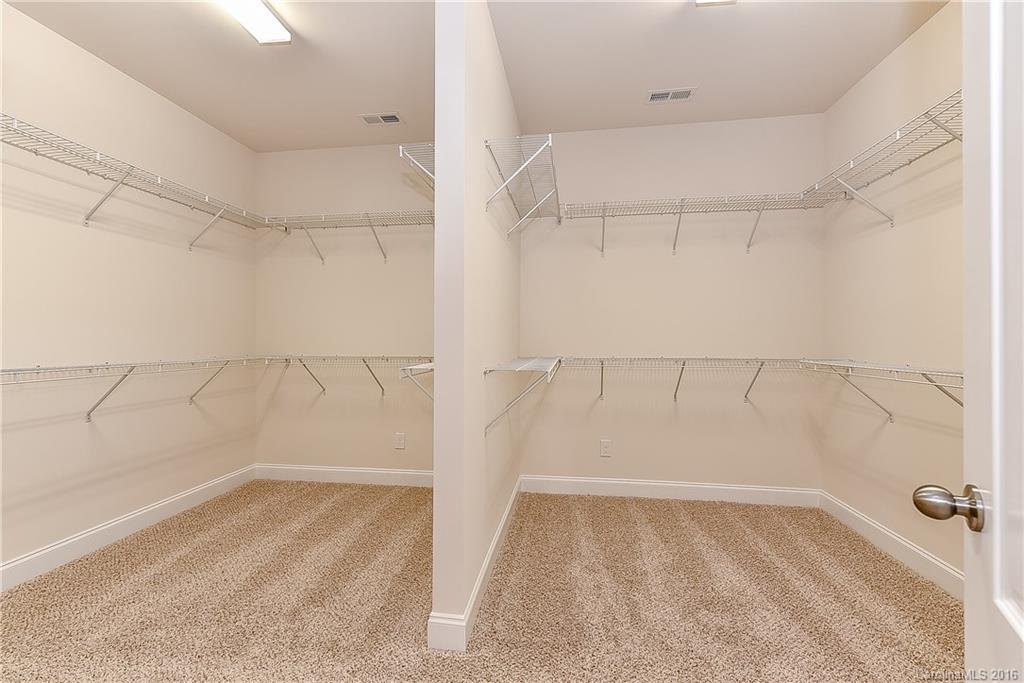604 Brookhaven Drive, Unit HKC 95 Fort Mill, SC 29708 - Photo 16 of 24 a view of a room with racks on the wall