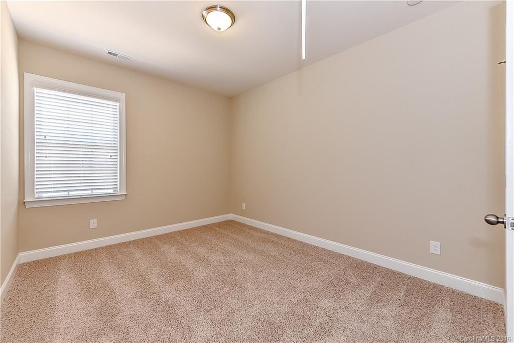 604 Brookhaven Drive, Unit HKC 95 Fort Mill, SC 29708 - Photo 21 of 24 an empty room with a window